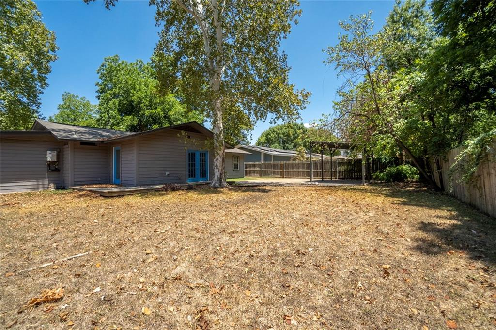 2105 Fortview Road Austin, TX 78704 - Photo 34 of 37 A spacious private yard offers abundant room for outdoor enjoyment and potential landscaping.