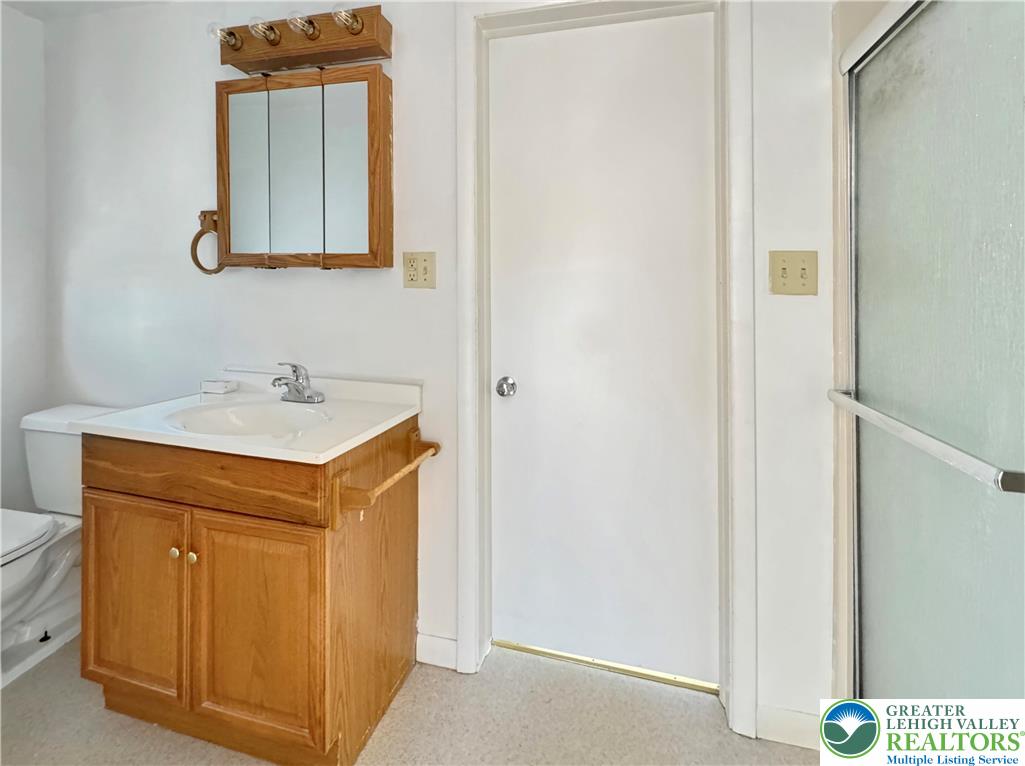 257 East 2nd Street Wind Gap, PA 18091 - Photo 12 of 14 a bathroom with a sink and a mirror