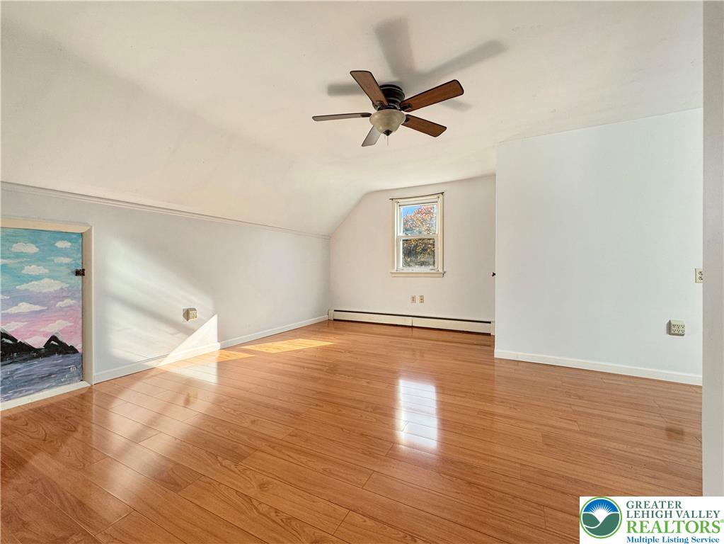 257 East 2nd Street Wind Gap, PA 18091 - Photo 8 of 14 a view of empty room with wooden floor and fan