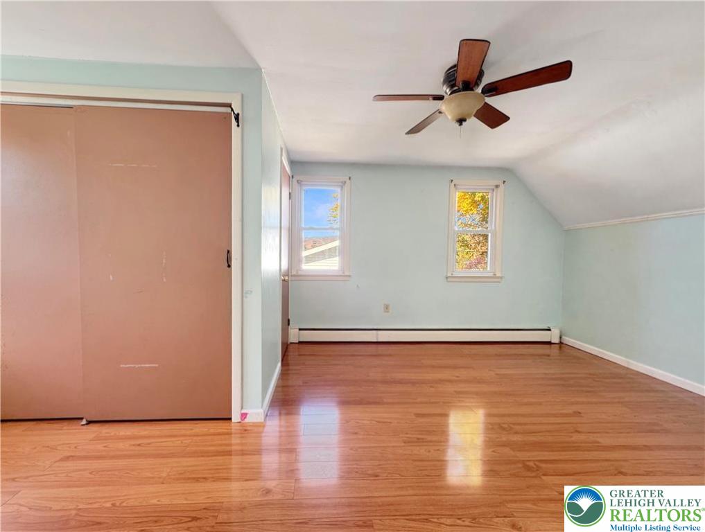 257 East 2nd Street Wind Gap, PA 18091 - Photo 9 of 14 a view of an empty room with wooden floor and a window