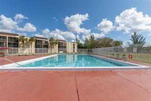 a view of backyard with green space