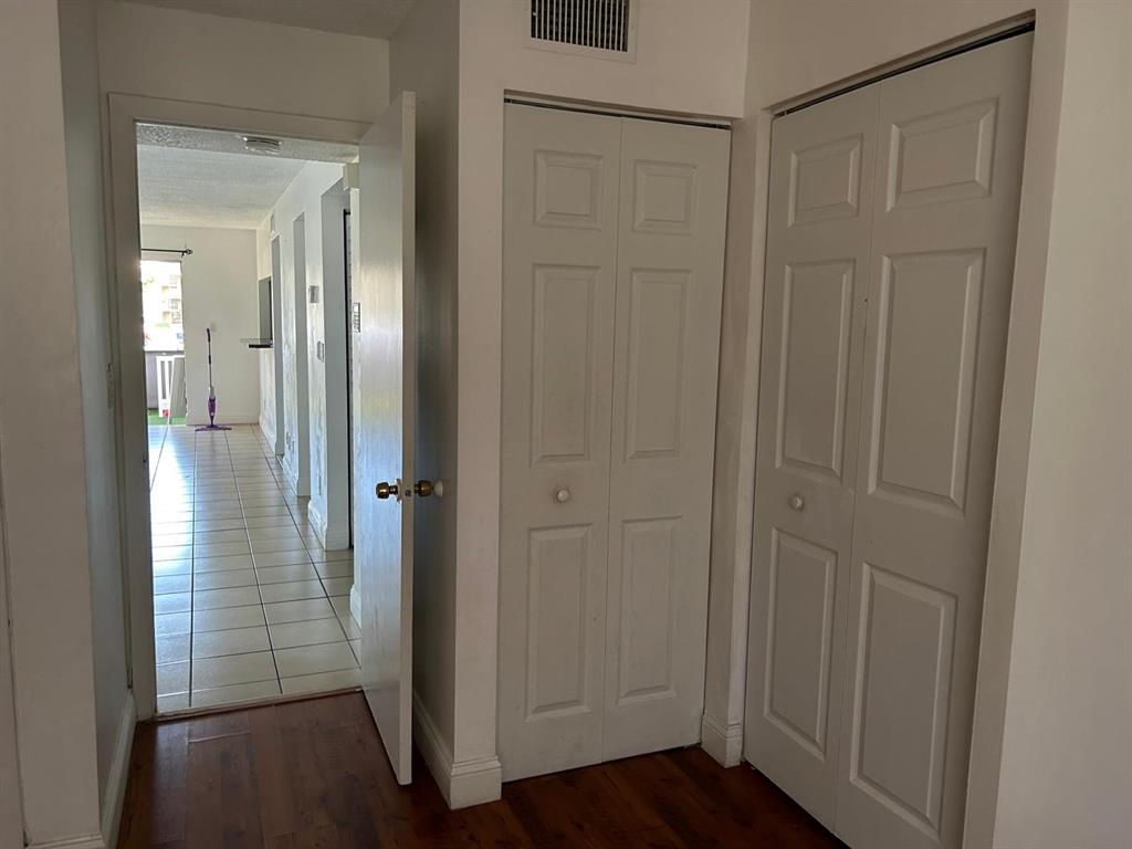 3252 Foxcroft Road, Unit 101 Miramar, FL 33025 - Photo 11 of 15 a view of a bathroom with wooden floor