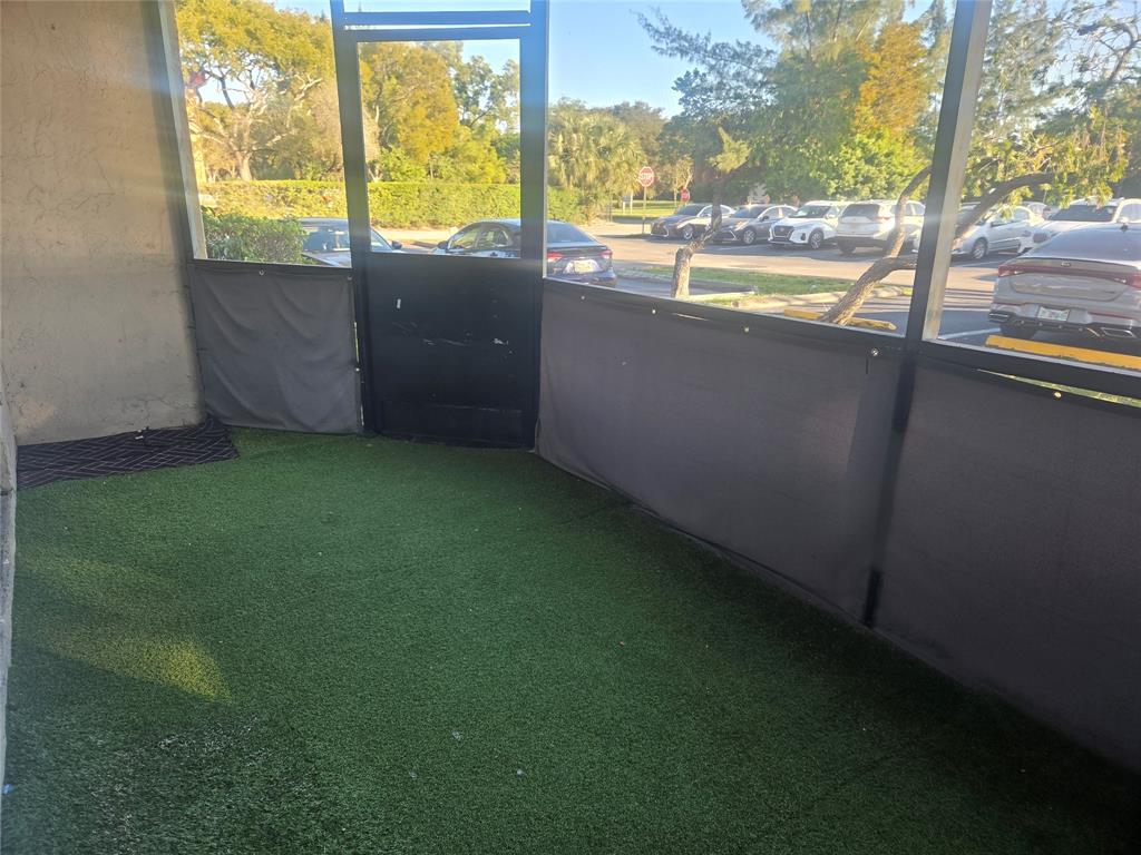 3252 Foxcroft Road, Unit 101 Miramar, FL 33025 - Photo 8 of 15 a view of an outdoor space with a lake view