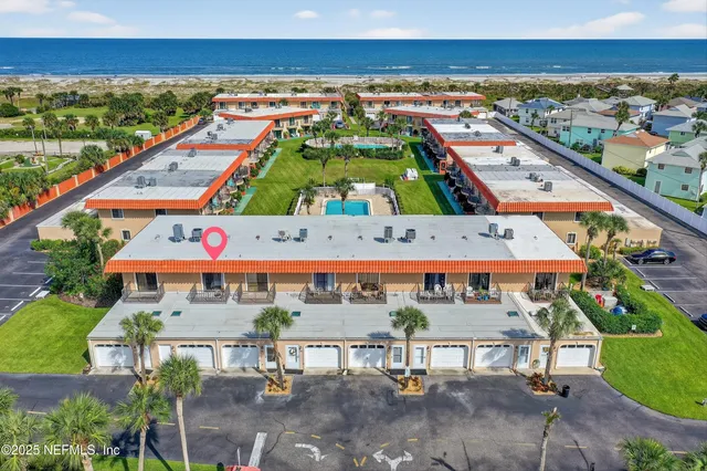 an aerial view of a building with balcony