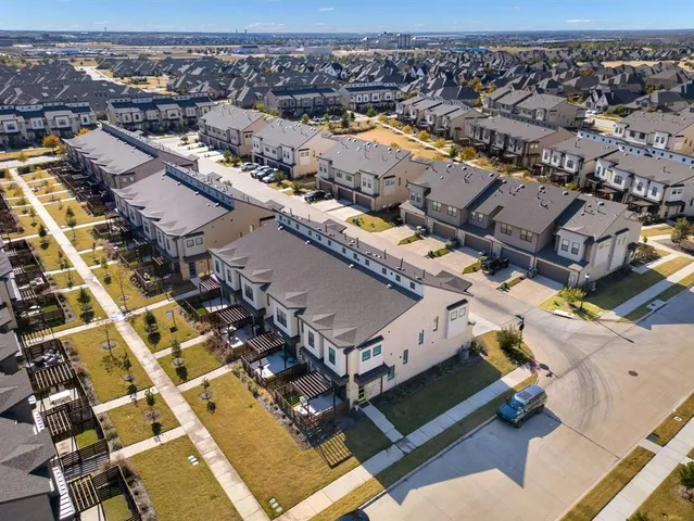 an aerial view of a building with outdoor space