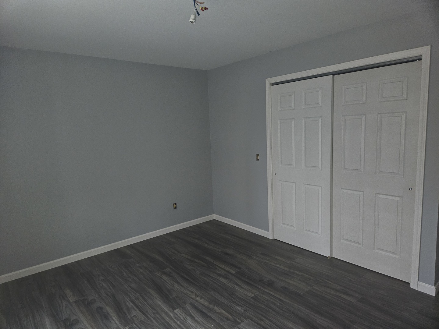 114 Evergreen Drive Ina, IL 62846 - Photo 14 of 20 a view of an empty room with wooden floor