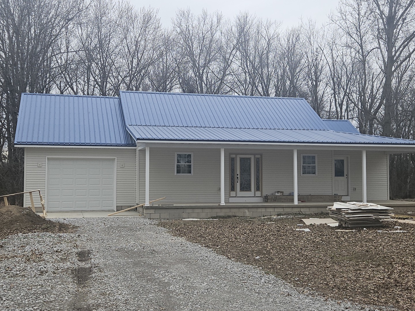 114 Evergreen Drive Ina, IL 62846 - Photo 3 of 20 a front view of a house with yard and trees