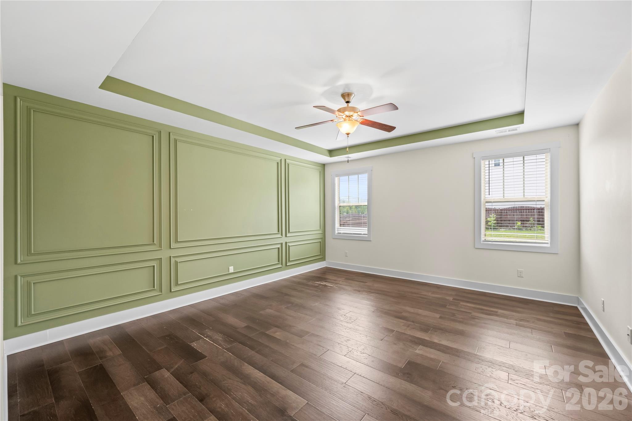 4 Henbit Way Arden, NC 28704 - Photo 13 of 38 an empty room with wooden floor and window