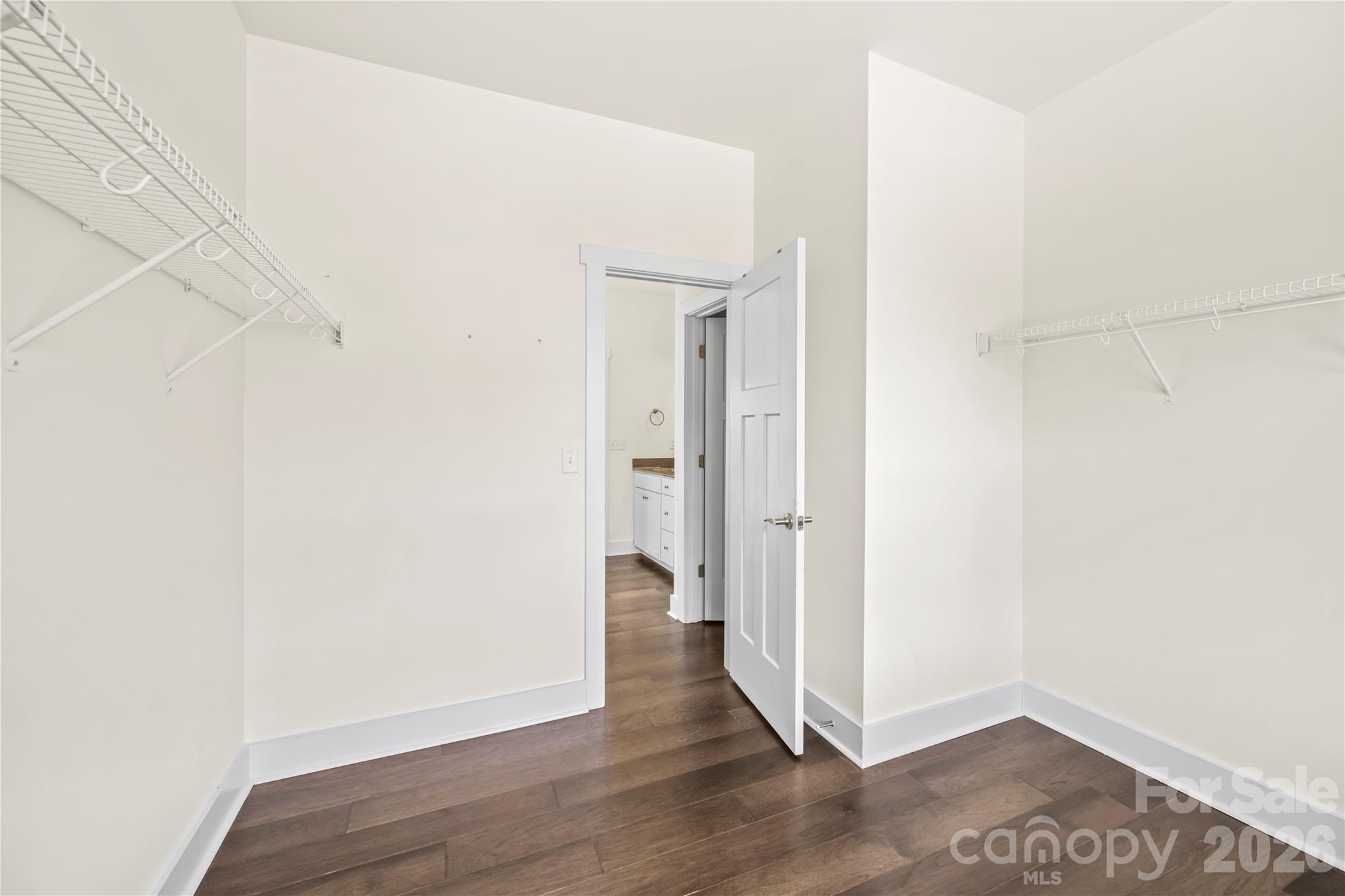 4 Henbit Way Arden, NC 28704 - Photo 16 of 38 a view of a hallway with wooden floor