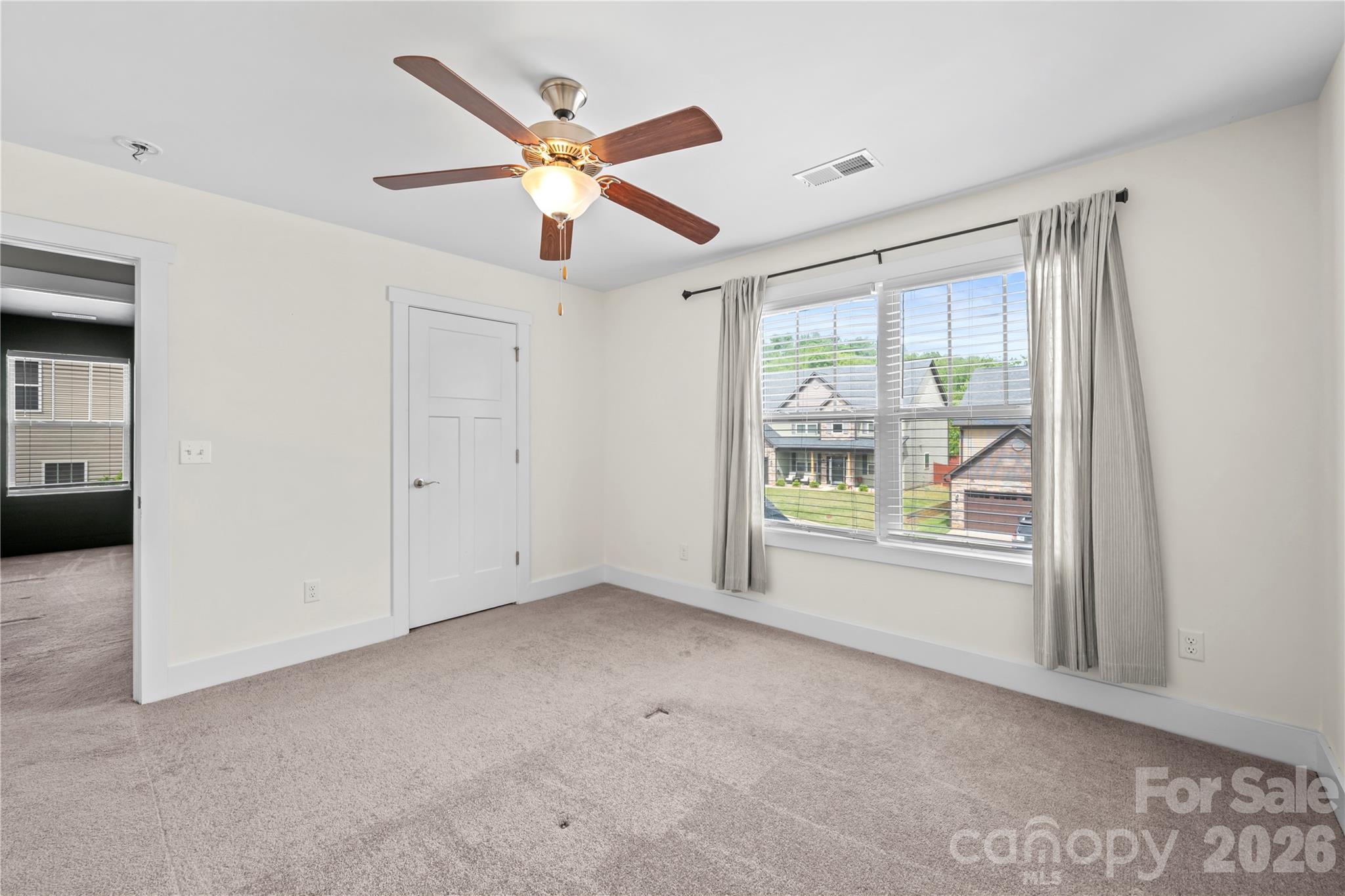 4 Henbit Way Arden, NC 28704 - Photo 30 of 38 a view of an empty room with a window