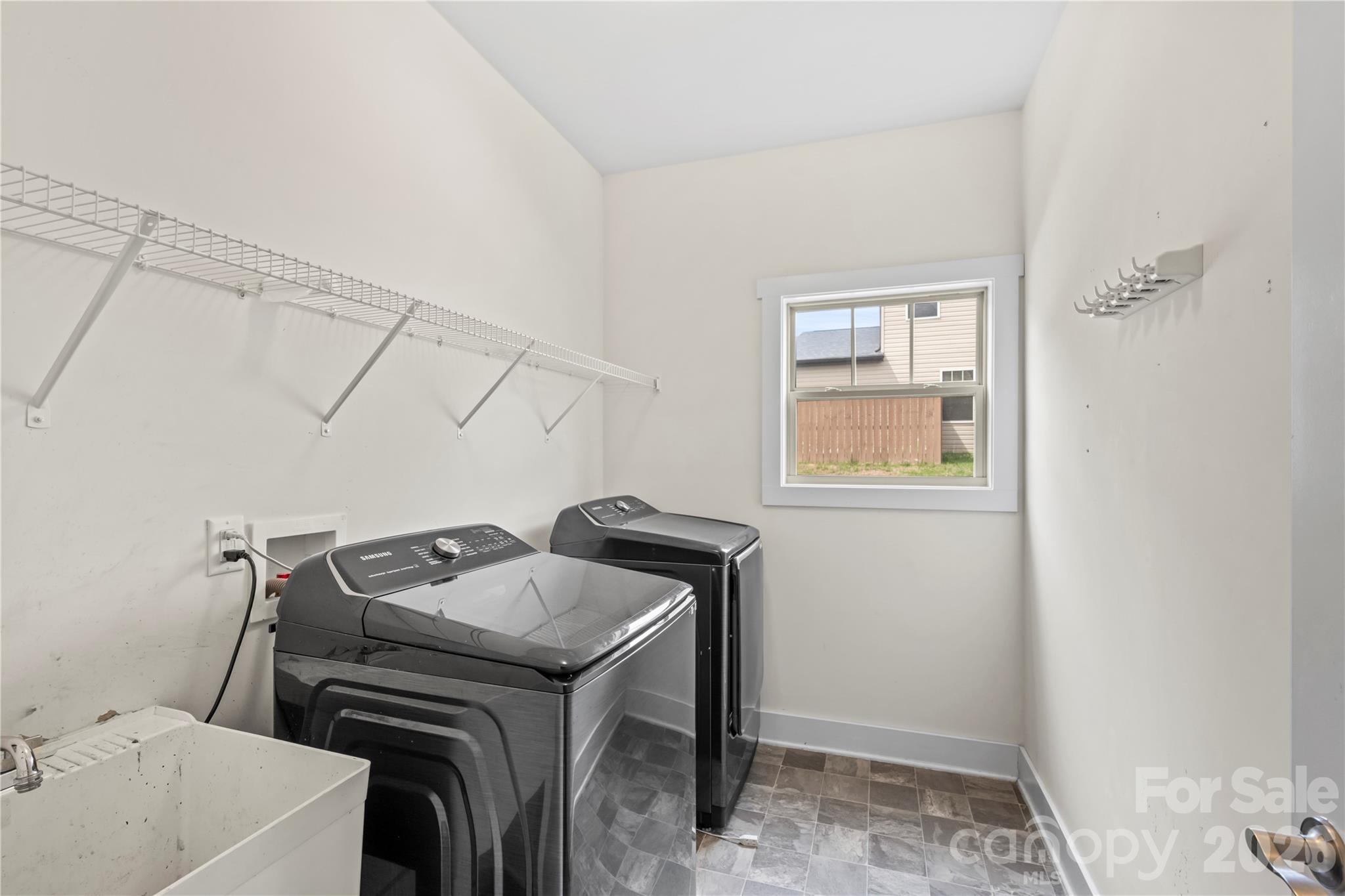 4 Henbit Way Arden, NC 28704 - Photo 31 of 38 a utility room with dryer and washer