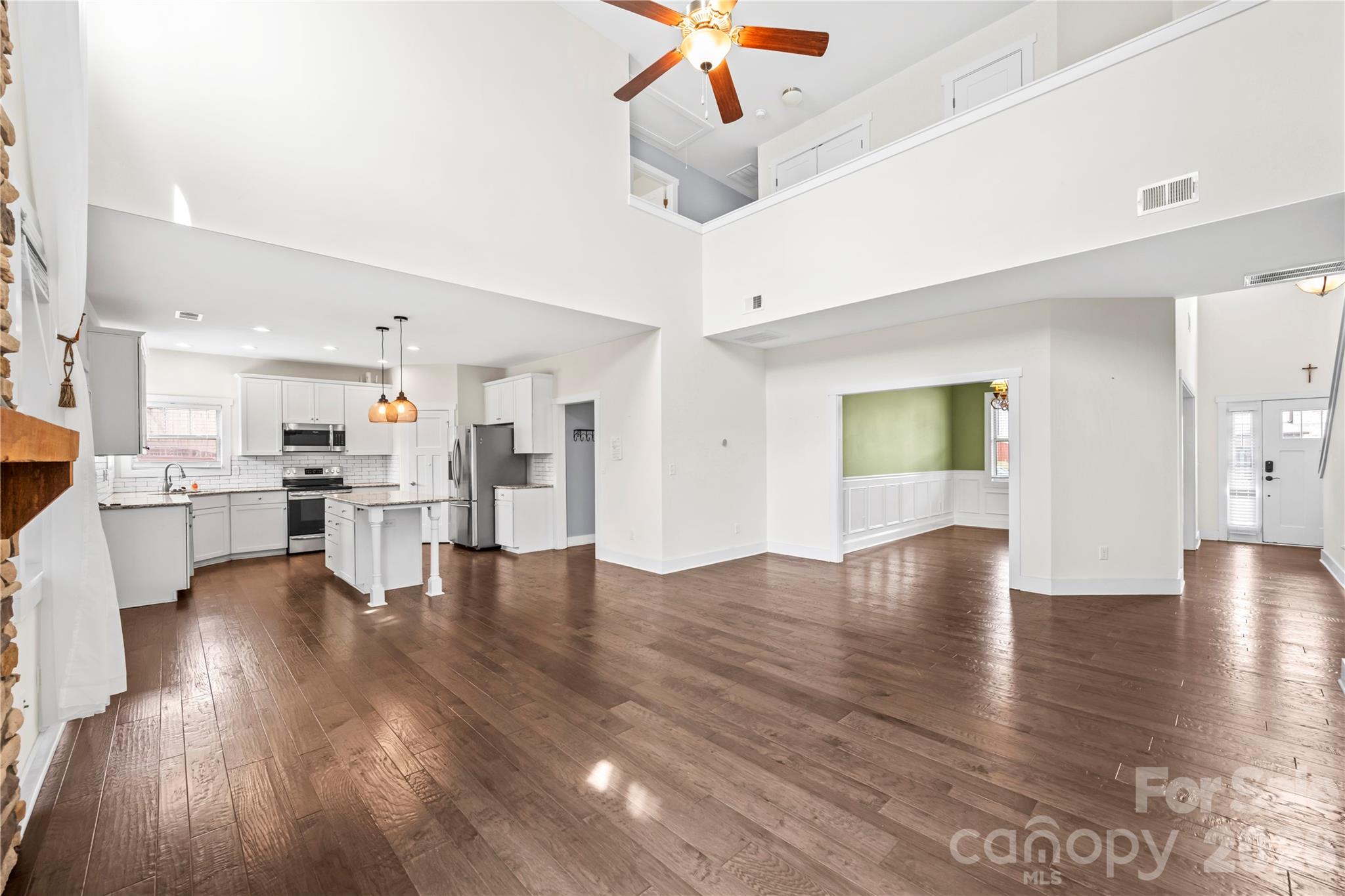 4 Henbit Way Arden, NC 28704 - Photo 5 of 38 a view of kitchen with furniture and wooden floor