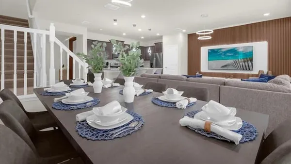 a bedroom with a bed and a view of wall painting