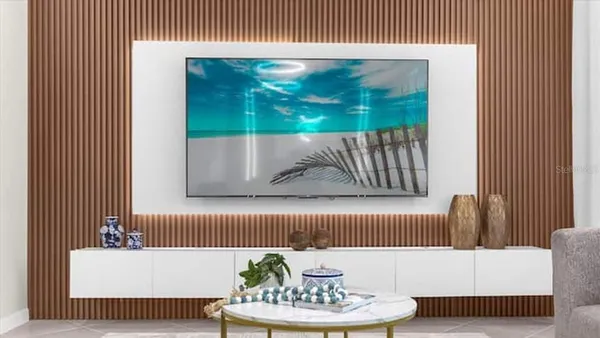 a living room with a couch and a table