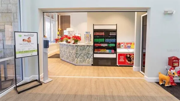 a view of a balcony with chairs