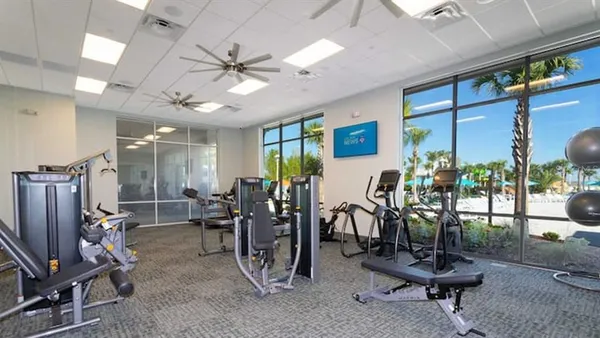 a view of a chairs and table in a patio