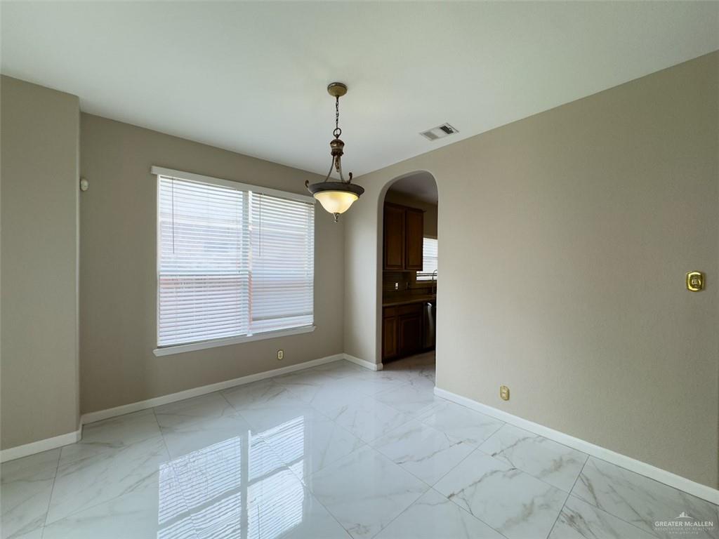 3402 San Sebastian Street Mission, TX 78572 - Photo 19 of 37 a view of an empty room with a window