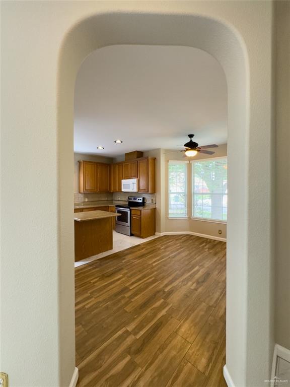 3402 San Sebastian Street Mission, TX 78572 - Photo 22 of 37 a view of a kitchen with wooden floor