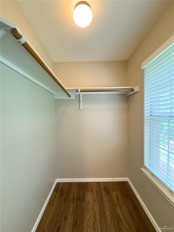 3402 San Sebastian Street Mission, TX 78572 - Photo 25 of 37 a view of a room with wooden floor and small window