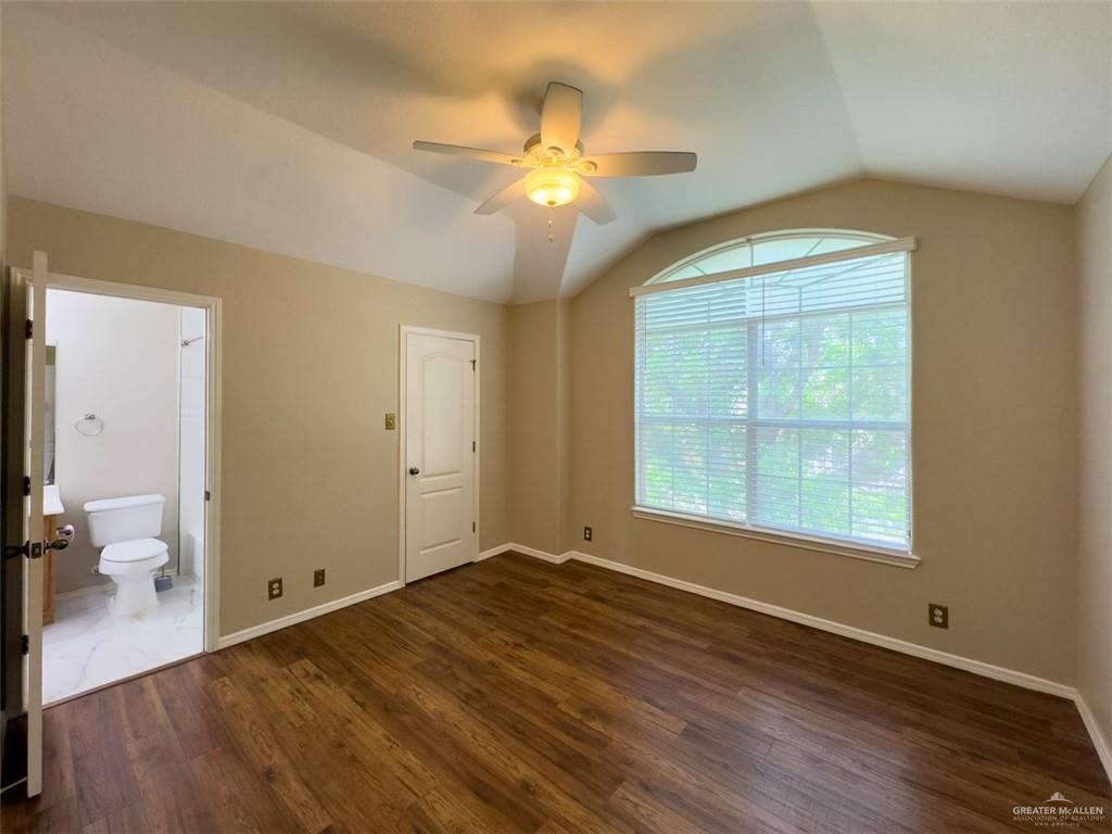 3402 San Sebastian Street Mission, TX 78572 - Photo 27 of 37 a view of an empty room with wooden floor and a window