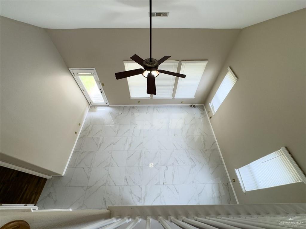 3402 San Sebastian Street Mission, TX 78572 - Photo 37 of 37 a view of a livingroom with a ceiling fan and window