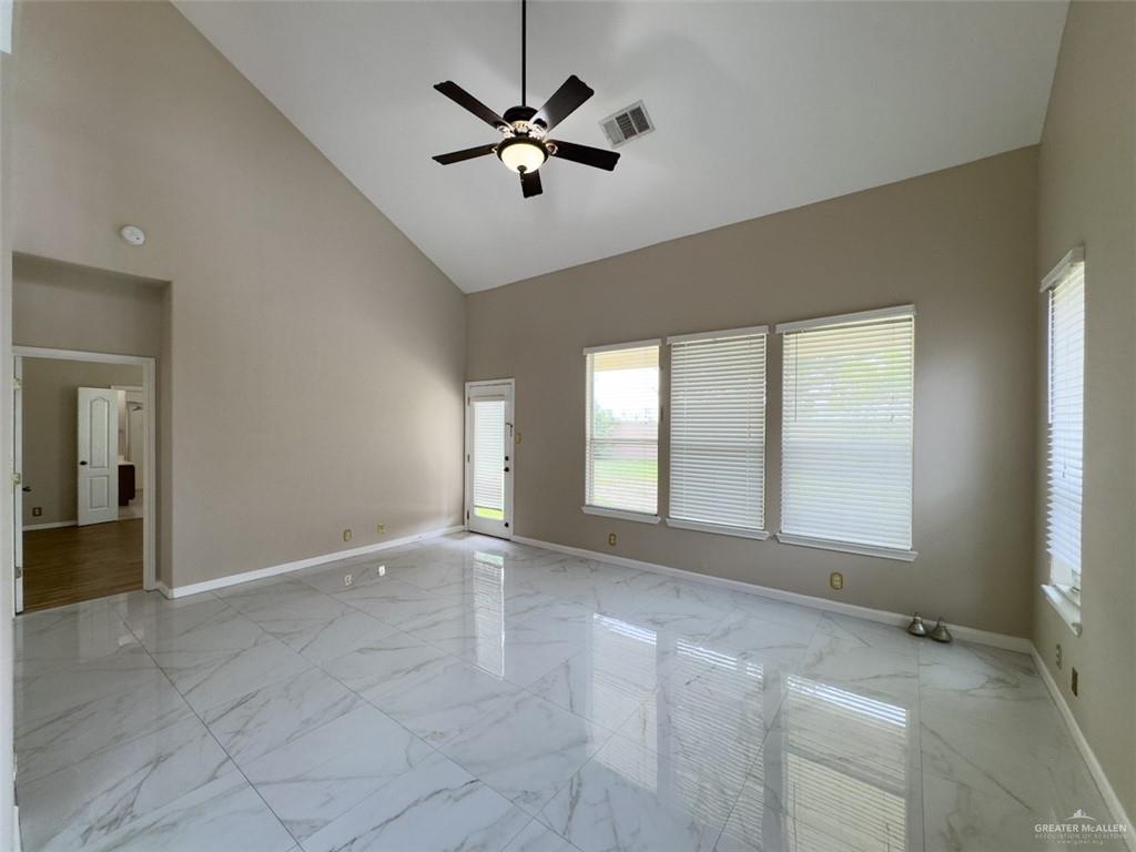 3402 San Sebastian Street Mission, TX 78572 - Photo 7 of 37 a view of an empty room with a window