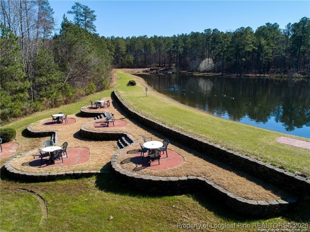 16 Cottswold Lane Spring Lake, NC 28390 - Photo 40 of 49 a view of a swimming pool with a yard