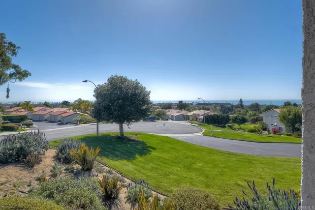 a view of a garden with an outdoor space