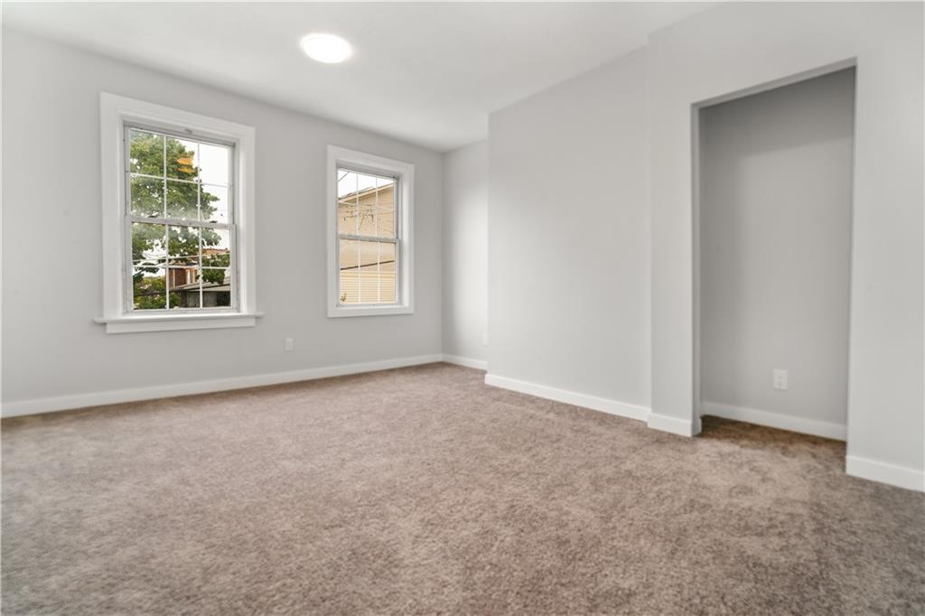 308 North Millvale Avenue Pittsburgh, PA 15224 - Photo 19 of 27 an empty room with windows