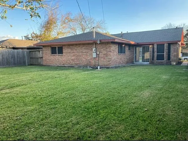 a backyard of a house with seating space