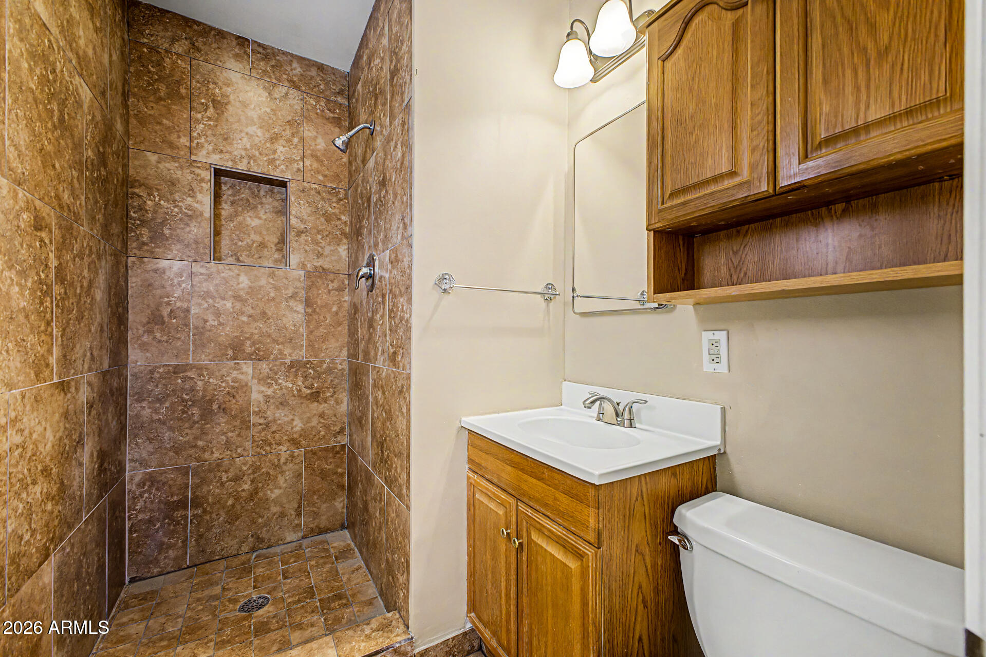 2022 East Monterey Way Phoenix, AZ 85016 - Photo 15 of 29 a bathroom with a sink a toilet and shower