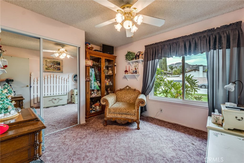2073 Suede Avenue Simi Valley, CA 93063 - Photo 16 of 33 a living room with furniture and a flat screen tv