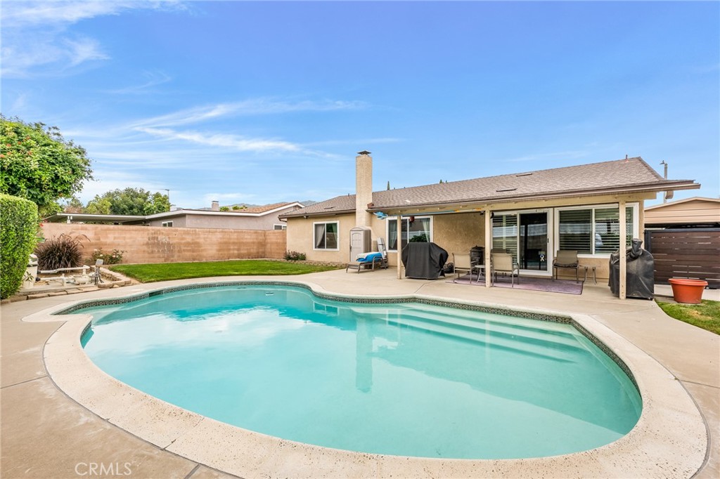 2073 Suede Avenue Simi Valley, CA 93063 - Photo 19 of 33 a view of a house with swimming pool