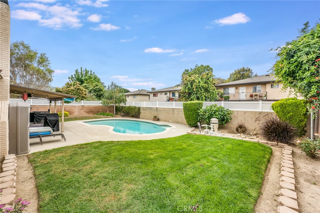 2073 Suede Avenue Simi Valley, CA 93063 - Photo 21 of 33 a view of a swimming pool with a patio