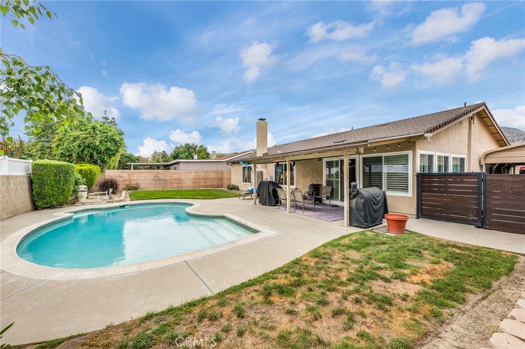2073 Suede Avenue Simi Valley, CA 93063 - Photo 23 of 33 a view of swimming pool with seating space