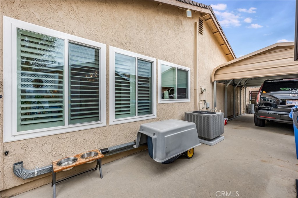 2073 Suede Avenue Simi Valley, CA 93063 - Photo 25 of 33 a living room with furniture and a window