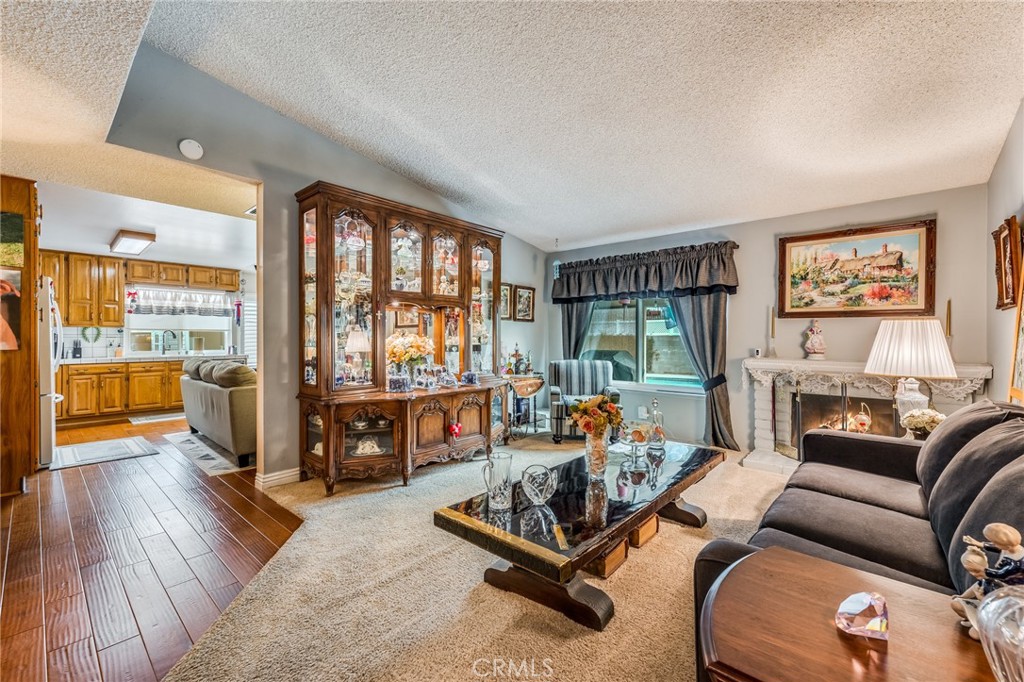 2073 Suede Avenue Simi Valley, CA 93063 - Photo 5 of 33 a living room with furniture and a large window