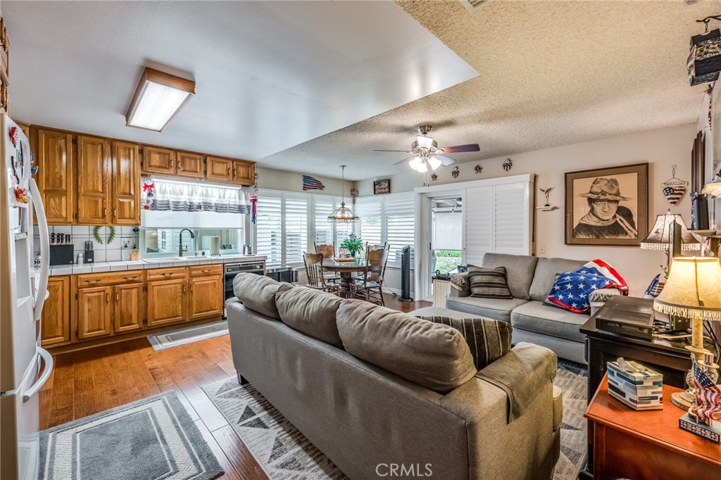 2073 Suede Avenue Simi Valley, CA 93063 - Photo 6 of 33 a living room with furniture and a large window