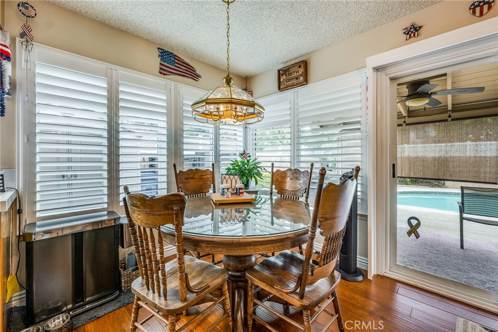 2073 Suede Avenue Simi Valley, CA 93063 - Photo 9 of 33 a view of a dining room with furniture and window