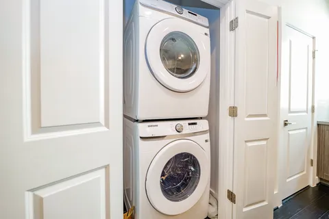 a utility room with dryer and washer
