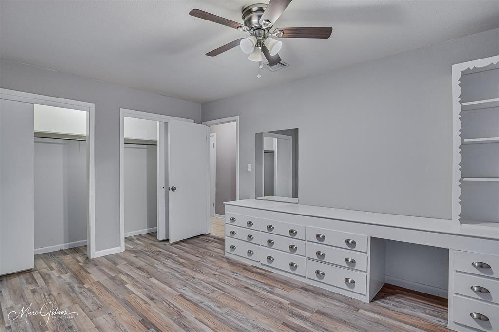 821 Princeton Road Princeton, LA 71067 - Photo 15 of 26 a view of a hallway with closet and chandelier fan