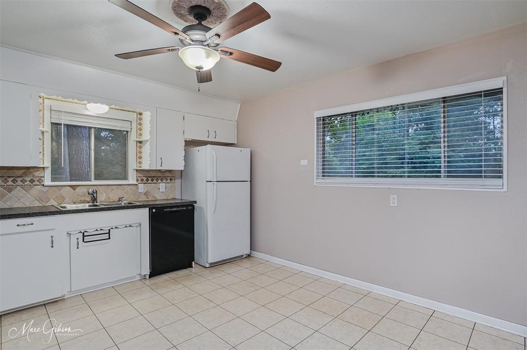 821 Princeton Road Princeton, LA 71067 - Photo 7 of 26 a kitchen with cabinets and window