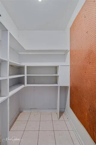 a view of an empty room with empty racks