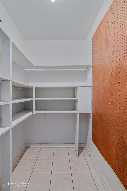 821 Princeton Road Princeton, LA 71067 - Photo 10 of 26 a view of an empty room with empty racks