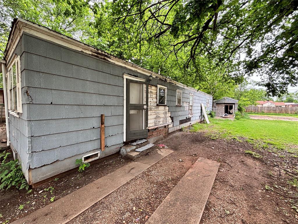 1503 North 8th Street Wichita Falls, TX 76306 - Photo 2 of 15 a house view with a backyard space