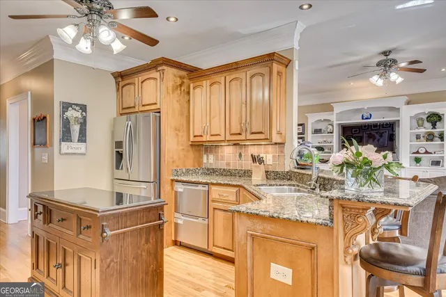 a spacious bedroom with a bed and a dresser