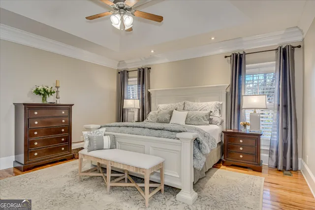 a bathroom with a double vanity sink mirror and shower