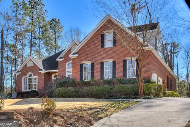 a front view of a house with a porch