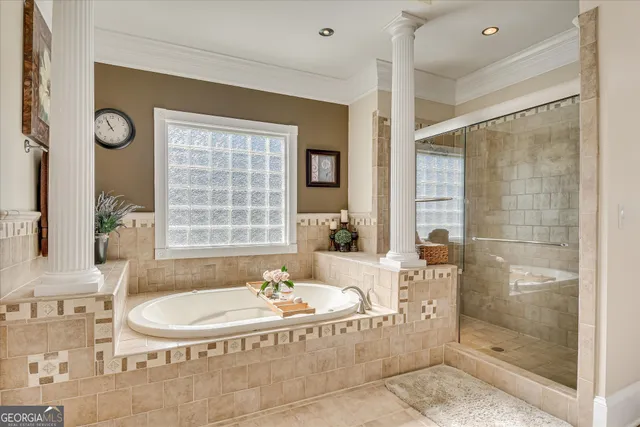 a bed room with a bed and a chandelier