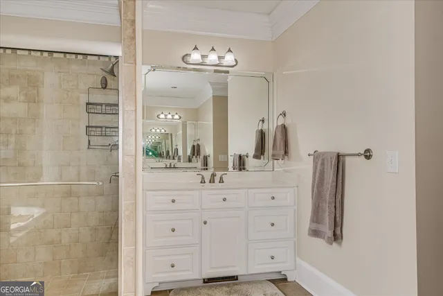 a utility room with sink dryer and washer